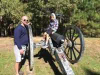 Father and son with Civil War cannon